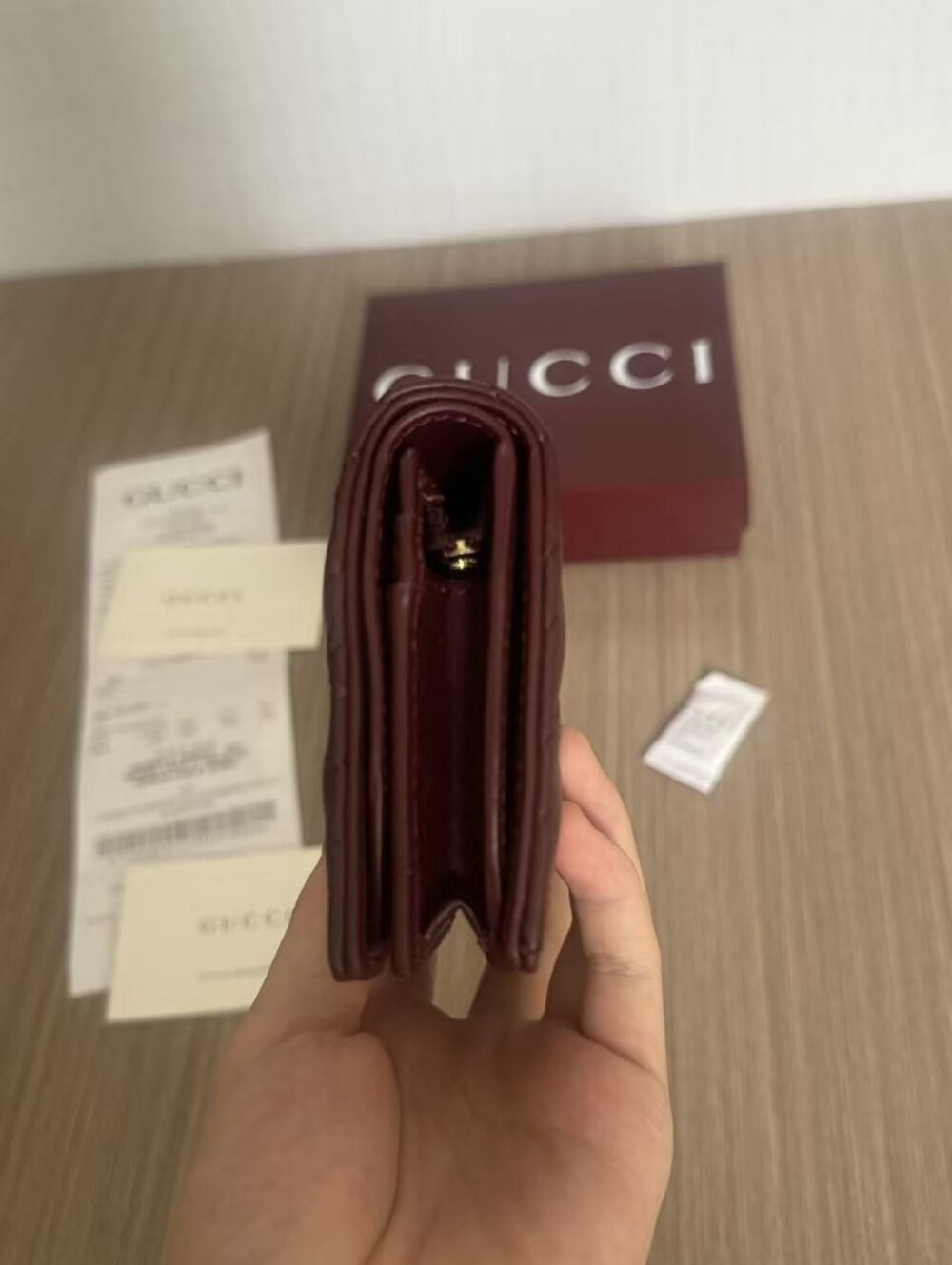 Gucci Quilted Burgundy Leather Compact Wallet with Gold GG - Picture 6 of 7